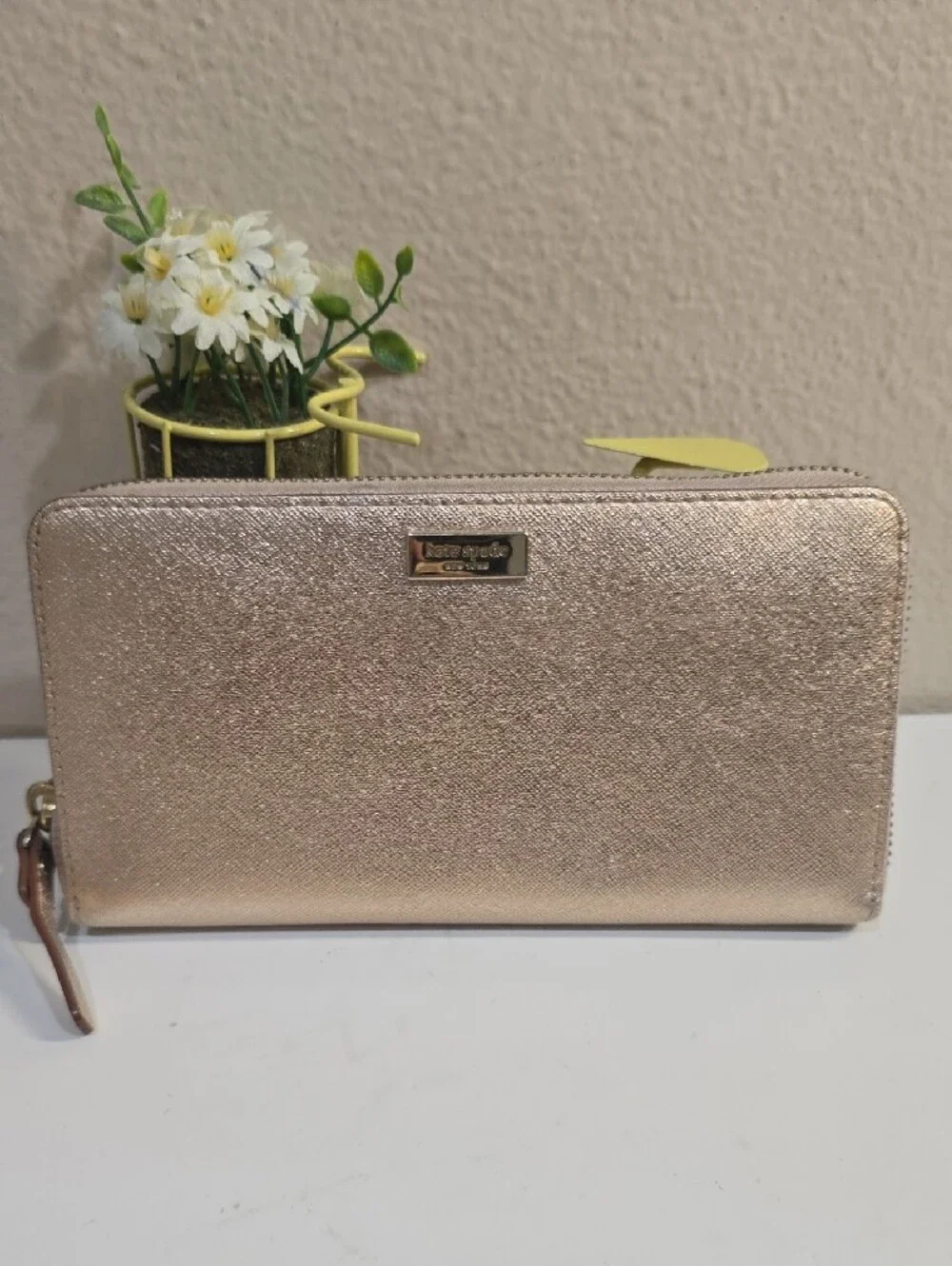 kate spade metallic rose gold zip-around continental wallet